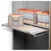 <div class="cpbg">
<p>Bulk filer pull-out work shelf <br/>
It's used when referencing documents within filing bays </p>
</div>