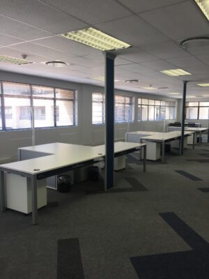 B-Line Single Workstations with Side Roller Door Credenza and Power Panel